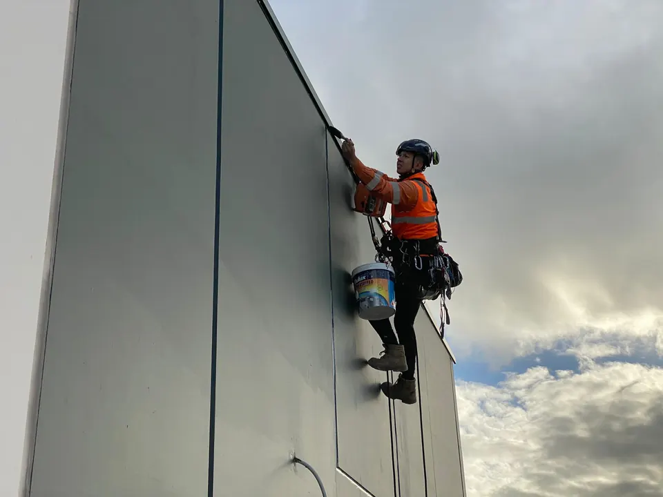 Rope-access façade works at Concarvo, Melbourne