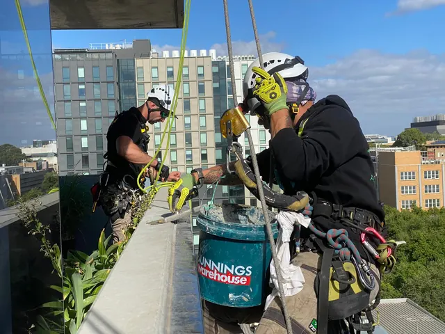 360 Access team performing rooftop works in Melbourne